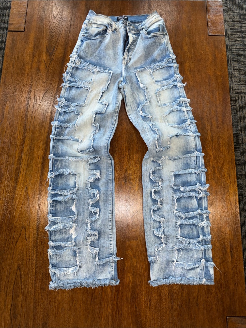 Women’s Light Blue Distressed Boot Cut Jeans